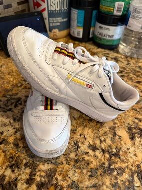 Reebok White Leather Sneakers with Red, Yellow and Black Stripes